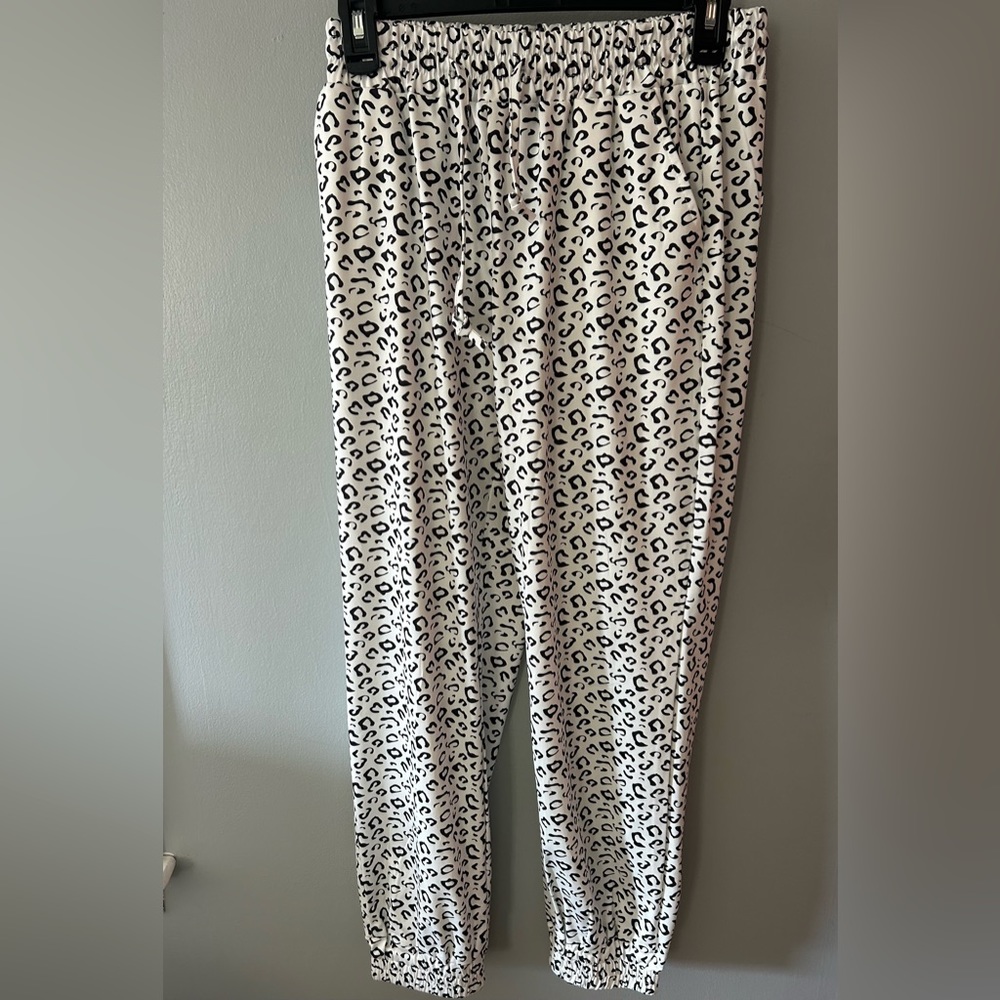 Belinda size medium white pants with black animal print